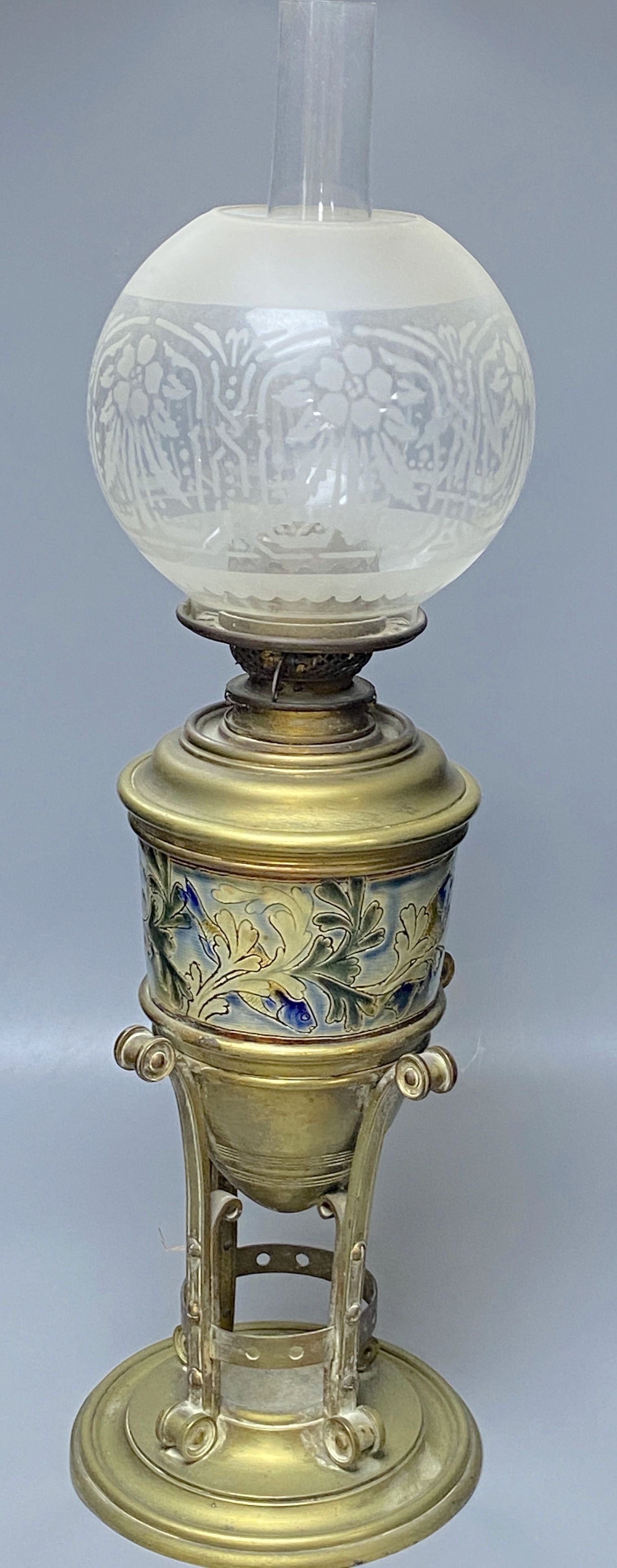 A Doultonesque oil lamp, overall height 67cm